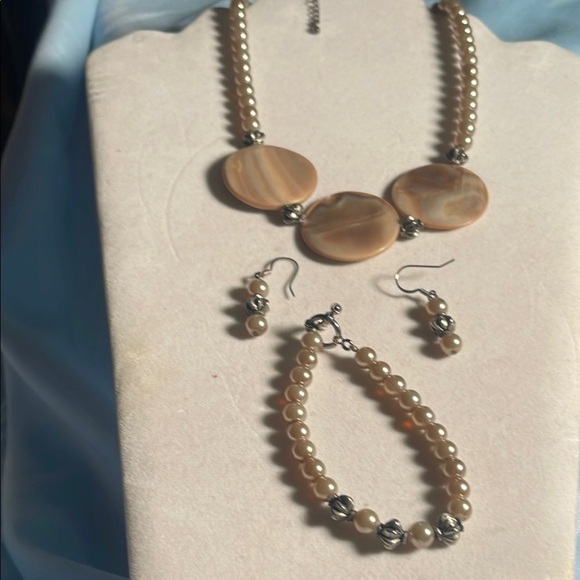 Cream and Tan Necklace with Minimalist Circular Mother of Pearl  Design - Picture 5 of 5